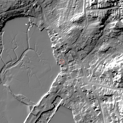 Shaded relief map of the ground around BH148JT, computed from Environment Agency LiDAR. The ground here sits at about 2 m above sea level and falls 40 m across the surrounding 800 m. Surface water reaching this point runs off ground lying to the north-north-east, 2.8 m higher.