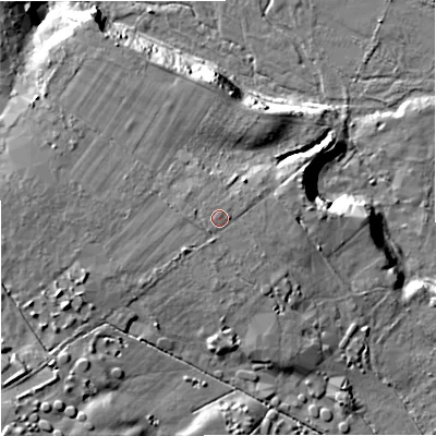 Shaded relief map of the ground around BH207NT, computed from Environment Agency LiDAR. The ground here sits at about 30 m above sea level and falls 26 m across the surrounding 800 m. Surface water reaching this point runs off ground lying to the south-west, 10.8 m higher.