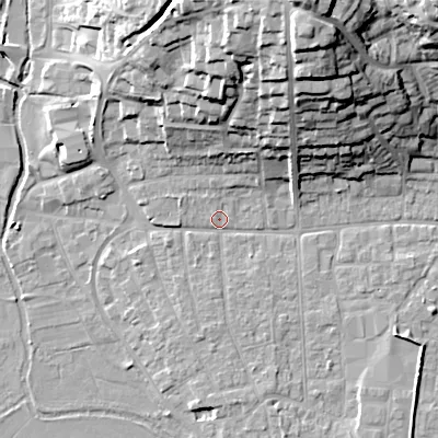 Shaded relief map of the ground around BH211AE, computed from Environment Agency LiDAR. The ground here sits at about 19 m above sea level and falls 32 m across the surrounding 800 m. Surface water reaching this point runs off ground lying to the south, 1.9 m higher.