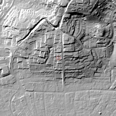 Shaded relief map of the ground around BH211BX, computed from Environment Agency LiDAR. The ground here sits at about 34 m above sea level and falls 47 m across the surrounding 800 m. Surface water reaching this point runs off ground lying to the north-north-east, 8.6 m higher.