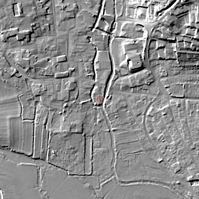 Shaded relief map of the ground around BH211DW, computed from Environment Agency LiDAR. The ground here sits at about 18 m above sea level and falls 23 m across the surrounding 800 m. Surface water reaching this point runs off ground lying to the north-west, 6.6 m higher.
