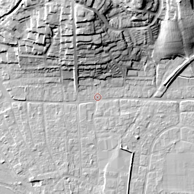 Shaded relief map of the ground around BH212AA, computed from Environment Agency LiDAR. The ground here sits at about 18 m above sea level and falls 32 m across the surrounding 800 m. Surface water reaching this point runs off ground lying to the north, 30.1 m higher.