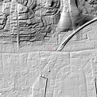 Shaded relief map of the ground around BH212AB, computed from Environment Agency LiDAR. The ground here sits at about 18 m above sea level and falls 32 m across the surrounding 800 m. Surface water reaching this point runs off ground lying to the north-north-west, 31.5 m higher.