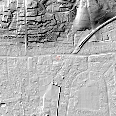 Shaded relief map of the ground around BH212AE, computed from Environment Agency LiDAR. The ground here sits at about 18 m above sea level and falls 30 m across the surrounding 800 m. Surface water reaching this point runs off ground lying to the north-north-west, 29.0 m higher.