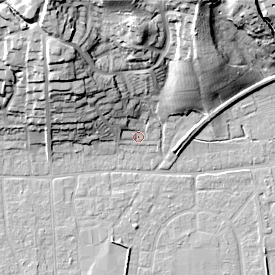 Shaded relief map of the ground around BH212AH, computed from Environment Agency LiDAR. The ground here sits at about 19 m above sea level and falls 35 m across the surrounding 800 m. Surface water reaching this point runs off ground lying to the north-north-west, 12.9 m higher.