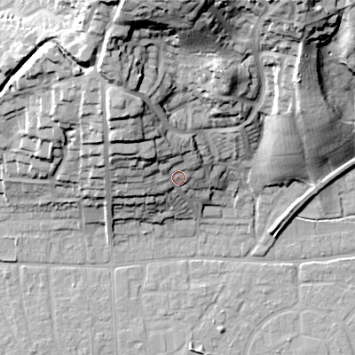Shaded relief map of the ground around BH212AJ, computed from Environment Agency LiDAR. The ground here sits at about 29 m above sea level and falls 43 m across the surrounding 800 m. Surface water reaching this point runs off ground lying to the north-west, 16.5 m higher.