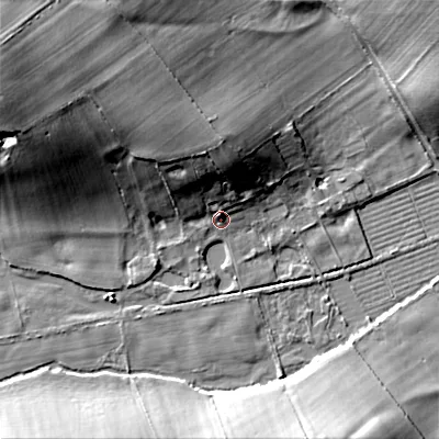 Shaded relief map of the ground around BH214AN, computed from Environment Agency LiDAR. The ground here sits at about 28 m above sea level and falls 21 m across the surrounding 800 m. Surface water reaching this point runs off ground lying to the north-north-west, 7.1 m higher.