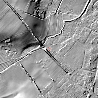 Shaded relief map of the ground around BH214BT, computed from Environment Agency LiDAR. The ground here sits at about 25 m above sea level and falls 14 m across the surrounding 800 m. Surface water reaching this point runs off ground lying to the north-west, 13.2 m higher.