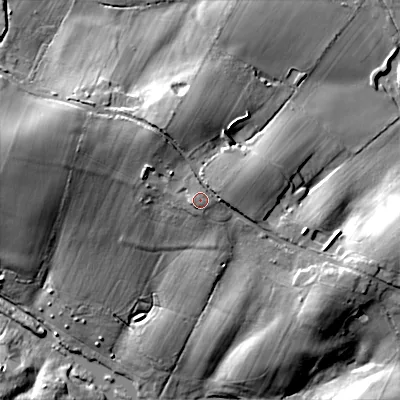 Shaded relief map of the ground around BH217JH, computed from Environment Agency LiDAR. The ground here sits at about 52 m above sea level and falls 24 m across the surrounding 800 m. Surface water reaching this point runs off ground lying to the north-west, 5.2 m higher.