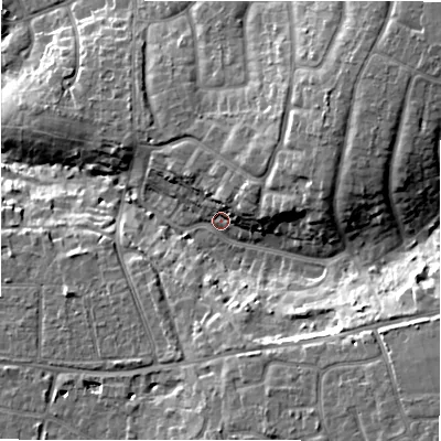 Shaded relief map of the ground around BH235BL, computed from Environment Agency LiDAR. The ground here sits at about 21 m above sea level and falls 16 m across the surrounding 800 m. Surface water reaching this point runs off ground lying to the north-east, 6.8 m higher.
