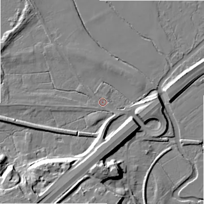 Shaded relief map of the ground around BH242DD, computed from Environment Agency LiDAR. The ground here sits at about 15 m above sea level and falls 19 m across the surrounding 800 m. Surface water reaching this point runs off ground lying to the south-west, 17.3 m higher.