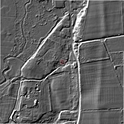 Shaded relief map of the ground around BH243AT, computed from Environment Agency LiDAR. The ground here sits at about 14 m above sea level and falls 10 m across the surrounding 800 m. Surface water reaching this point runs off ground lying to the east, 5.8 m higher.