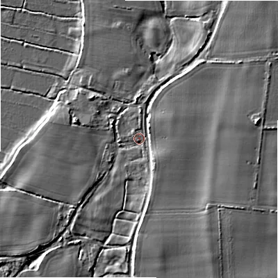 Shaded relief map of the ground around BH243BJ, computed from Environment Agency LiDAR. The ground here sits at about 13 m above sea level and falls 9 m across the surrounding 800 m. Surface water reaching this point runs off ground lying to the east, 6.5 m higher.