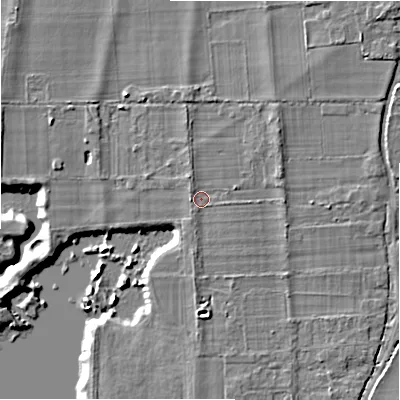 Shaded relief map of the ground around BH243NP, computed from Environment Agency LiDAR. The ground here sits at about 26 m above sea level and falls 7 m across the surrounding 800 m. Surface water reaching this point runs off ground lying to the north-east, 1.6 m higher.