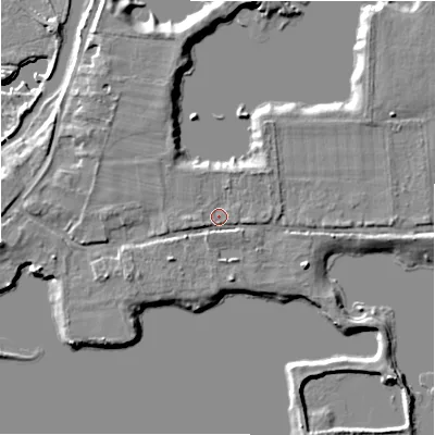 Shaded relief map of the ground around BH243PR, computed from Environment Agency LiDAR. The ground here sits at about 25 m above sea level and falls 8 m across the surrounding 800 m. Surface water reaching this point runs off ground lying to the east-north-east, 2.5 m higher.