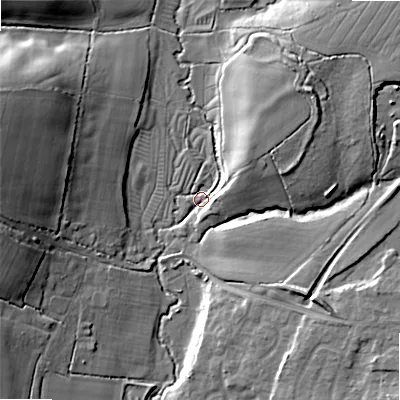 Shaded relief map of the ground around BH317LD, computed from Environment Agency LiDAR. The ground here sits at about 35 m above sea level and falls 23 m across the surrounding 800 m. Surface water reaching this point runs off ground lying to the west-north-west, 21.1 m higher.