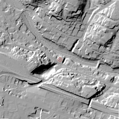 Shaded relief map of the ground around BH49HR, computed from Environment Agency LiDAR. The ground here sits at about 20 m above sea level and falls 35 m across the surrounding 800 m. Surface water reaching this point runs off ground lying to the west, 21.4 m higher.