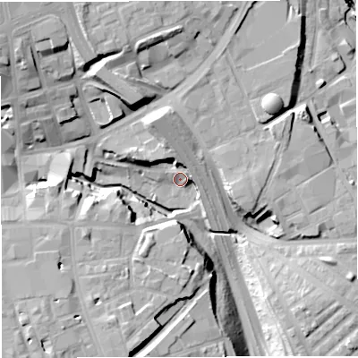 Shaded relief map of the ground around BL11TZ, computed from Environment Agency LiDAR. The ground here sits at about 83 m above sea level and falls 25 m across the surrounding 800 m. Surface water reaching this point runs off ground lying to the north-west, 22.1 m higher.