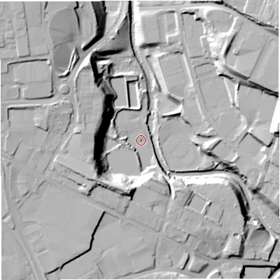 Shaded relief map of the ground around BL12TE, computed from Environment Agency LiDAR. The ground here sits at about 83 m above sea level and falls 32 m across the surrounding 800 m. Surface water reaching this point runs off ground lying to the west-north-west, 18.9 m higher.