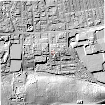 Shaded relief map of the ground around BL14LX, computed from Environment Agency LiDAR. The ground here sits at about 124 m above sea level and falls 43 m across the surrounding 800 m. Surface water reaching this point runs off ground lying to the west-north-west, 12.9 m higher.