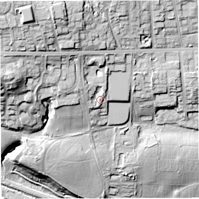 Shaded relief map of the ground around BL15BJ, computed from Environment Agency LiDAR. The ground here sits at about 129 m above sea level and falls 57 m across the surrounding 800 m. Surface water reaching this point runs off ground lying to the north-west, 14.1 m higher.