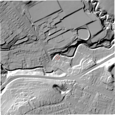 Shaded relief map of the ground around BL16JL, computed from Environment Agency LiDAR. The ground here sits at about 128 m above sea level and falls 56 m across the surrounding 800 m. Surface water reaching this point runs off ground lying to the north-west, 41.8 m higher.