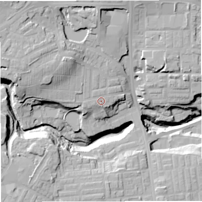 Shaded relief map of the ground around BL16NW, computed from Environment Agency LiDAR. The ground here sits at about 113 m above sea level and falls 36 m across the surrounding 800 m. Surface water reaching this point runs off ground lying to the west-north-west, 9.6 m higher.
