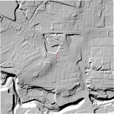Shaded relief map of the ground around BL16PU, computed from Environment Agency LiDAR. The ground here sits at about 115 m above sea level and falls 44 m across the surrounding 800 m. Surface water reaching this point runs off ground lying to the north-west, 18.7 m higher.