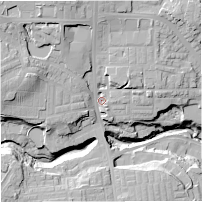 Shaded relief map of the ground around BL18EQ, computed from Environment Agency LiDAR. The ground here sits at about 107 m above sea level and falls 38 m across the surrounding 800 m. Surface water reaching this point runs off ground lying to the north-north-west, 17.0 m higher.