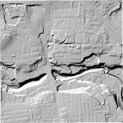 Shaded relief map of the ground around BL18PN, computed from Environment Agency LiDAR. The ground here sits at about 107 m above sea level and falls 37 m across the surrounding 800 m. Surface water reaching this point runs off ground lying to the north, 9.5 m higher.