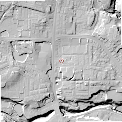 Shaded relief map of the ground around BL18QQ, computed from Environment Agency LiDAR. The ground here sits at about 113 m above sea level and falls 46 m across the surrounding 800 m. Surface water reaching this point runs off ground lying to the north, 12.7 m higher.