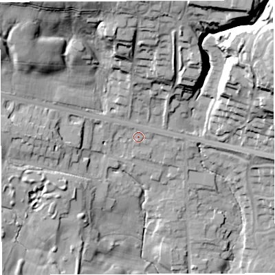 Shaded relief map of the ground around BL64AA, computed from Environment Agency LiDAR. The ground here sits at about 120 m above sea level and falls 44 m across the surrounding 800 m. Surface water reaching this point runs off ground lying to the east-north-east, 2.1 m higher.