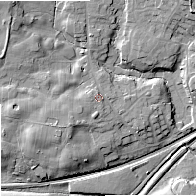 Shaded relief map of the ground around BL64DE, computed from Environment Agency LiDAR. The ground here sits at about 114 m above sea level and falls 24 m across the surrounding 800 m. Surface water reaching this point runs off ground lying to the west-south-west, 2.1 m higher.