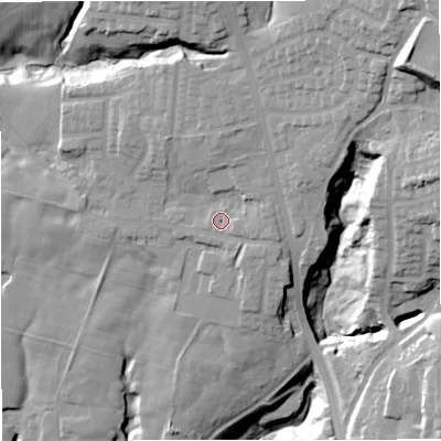 Shaded relief map of the ground around BL95JE, computed from Environment Agency LiDAR. The ground here sits at about 125 m above sea level and falls 45 m across the surrounding 800 m. Surface water reaching this point runs off ground lying to the north, 7.1 m higher.
