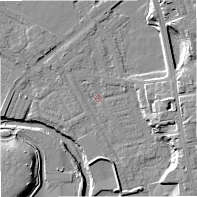 Shaded relief map of the ground around BL99PX, computed from Environment Agency LiDAR. The ground here sits at about 70 m above sea level and falls 18 m across the surrounding 800 m. Surface water reaching this point runs off ground lying to the north-east, 12.1 m higher.