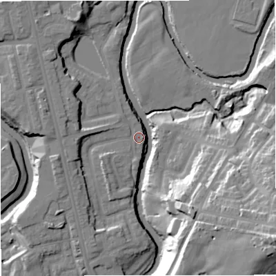 Shaded relief map of the ground around BL99UA, computed from Environment Agency LiDAR. The ground here sits at about 69 m above sea level and falls 37 m across the surrounding 800 m. Surface water reaching this point runs off ground lying to the west, 5.2 m higher.