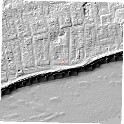 Shaded relief map of the ground around BN112EX, computed from Environment Agency LiDAR. The ground here sits at about 5 m above sea level and falls 11 m across the surrounding 800 m. Surface water reaching this point runs off ground lying to the north, 2.5 m higher.