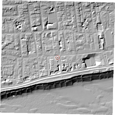 Shaded relief map of the ground around BN113BX, computed from Environment Agency LiDAR. The ground here sits at about 5 m above sea level and falls 13 m across the surrounding 800 m. Surface water reaching this point runs off ground lying to the north-north-west, 7.5 m higher.