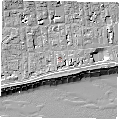 Shaded relief map of the ground around BN113BY, computed from Environment Agency LiDAR. The ground here sits at about 5 m above sea level and falls 13 m across the surrounding 800 m. Surface water reaching this point runs off ground lying to the west-south-west, 2.5 m higher.