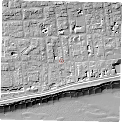 Shaded relief map of the ground around BN113JG, computed from Environment Agency LiDAR. The ground here sits at about 5 m above sea level and falls 13 m across the surrounding 800 m. Surface water reaching this point runs off ground lying to the south-west, 2.8 m higher.