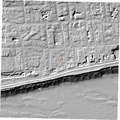 Shaded relief map of the ground around BN113LS, computed from Environment Agency LiDAR. The ground here sits at about 5 m above sea level and falls 12 m across the surrounding 800 m. Surface water reaching this point runs off ground lying to the west-south-west, 2.5 m higher.