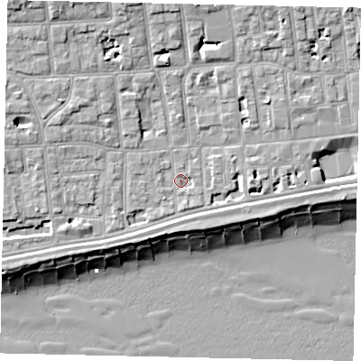 Shaded relief map of the ground around BN113LU, computed from Environment Agency LiDAR. The ground here sits at about 4 m above sea level and falls 12 m across the surrounding 800 m. Surface water reaching this point runs off ground lying to the west-south-west, 2.4 m higher.
