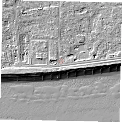 Shaded relief map of the ground around BN115EH, computed from Environment Agency LiDAR. The ground here sits at about 4 m above sea level and falls 9 m across the surrounding 800 m. Surface water reaching this point runs off ground lying to the north-east, 3.7 m higher.
