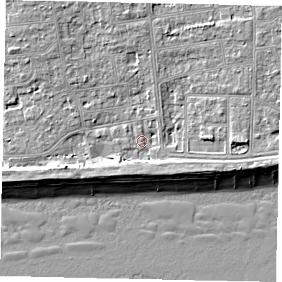 Shaded relief map of the ground around BN124DL, computed from Environment Agency LiDAR. The ground here sits at about 4 m above sea level and falls 9 m across the surrounding 800 m. Surface water reaching this point runs off ground lying to the north-east, 2.6 m higher.
