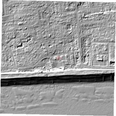 Shaded relief map of the ground around BN124FG, computed from Environment Agency LiDAR. The ground here sits at about 4 m above sea level and falls 9 m across the surrounding 800 m. Surface water reaching this point runs off ground lying to the north-north-west, 5.5 m higher.