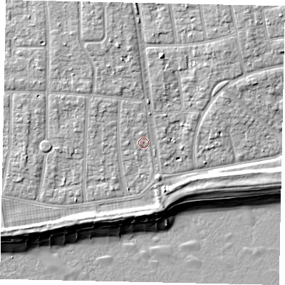 Shaded relief map of the ground around BN124QB, computed from Environment Agency LiDAR. The ground here sits at about 5 m above sea level and falls 9 m across the surrounding 800 m. Surface water reaching this point runs off ground lying to the north-north-west, 1.1 m higher.