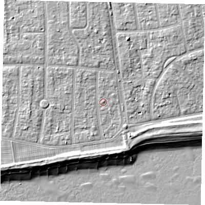 Shaded relief map of the ground around BN124QP, computed from Environment Agency LiDAR. The ground here sits at about 5 m above sea level and falls 9 m across the surrounding 800 m. Surface water reaching this point runs off ground lying to the north-west, 1.5 m higher.