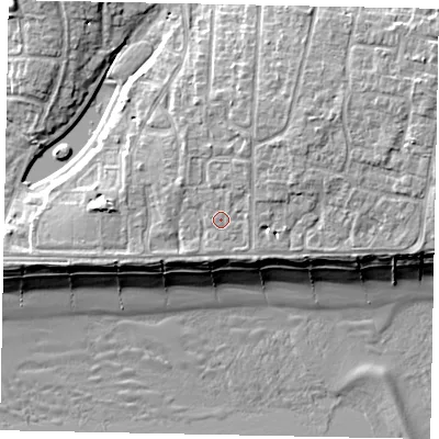 Shaded relief map of the ground around BN162LY, computed from Environment Agency LiDAR. The ground here sits at about 6 m above sea level and falls 10 m across the surrounding 800 m. Surface water reaching this point runs off ground lying to the north-north-east, 1.1 m higher.