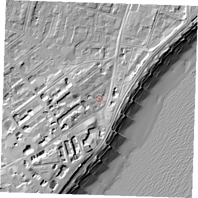 Shaded relief map of the ground around BN213DW, computed from Environment Agency LiDAR. The ground here sits at about 4 m above sea level and falls 15 m across the surrounding 800 m. Surface water reaching this point runs off ground lying to the west, 1.9 m higher.