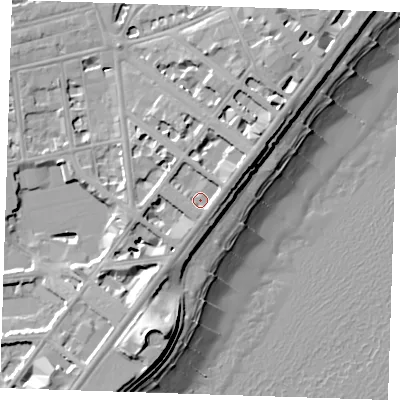 Shaded relief map of the ground around BN214DL, computed from Environment Agency LiDAR. The ground here sits at about 9 m above sea level and falls 19 m across the surrounding 800 m. Surface water reaching this point runs off ground lying to the east-north-east, 3.2 m higher.